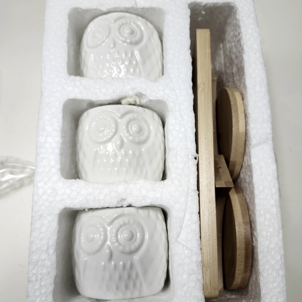 3 piece Owl planters with stand.